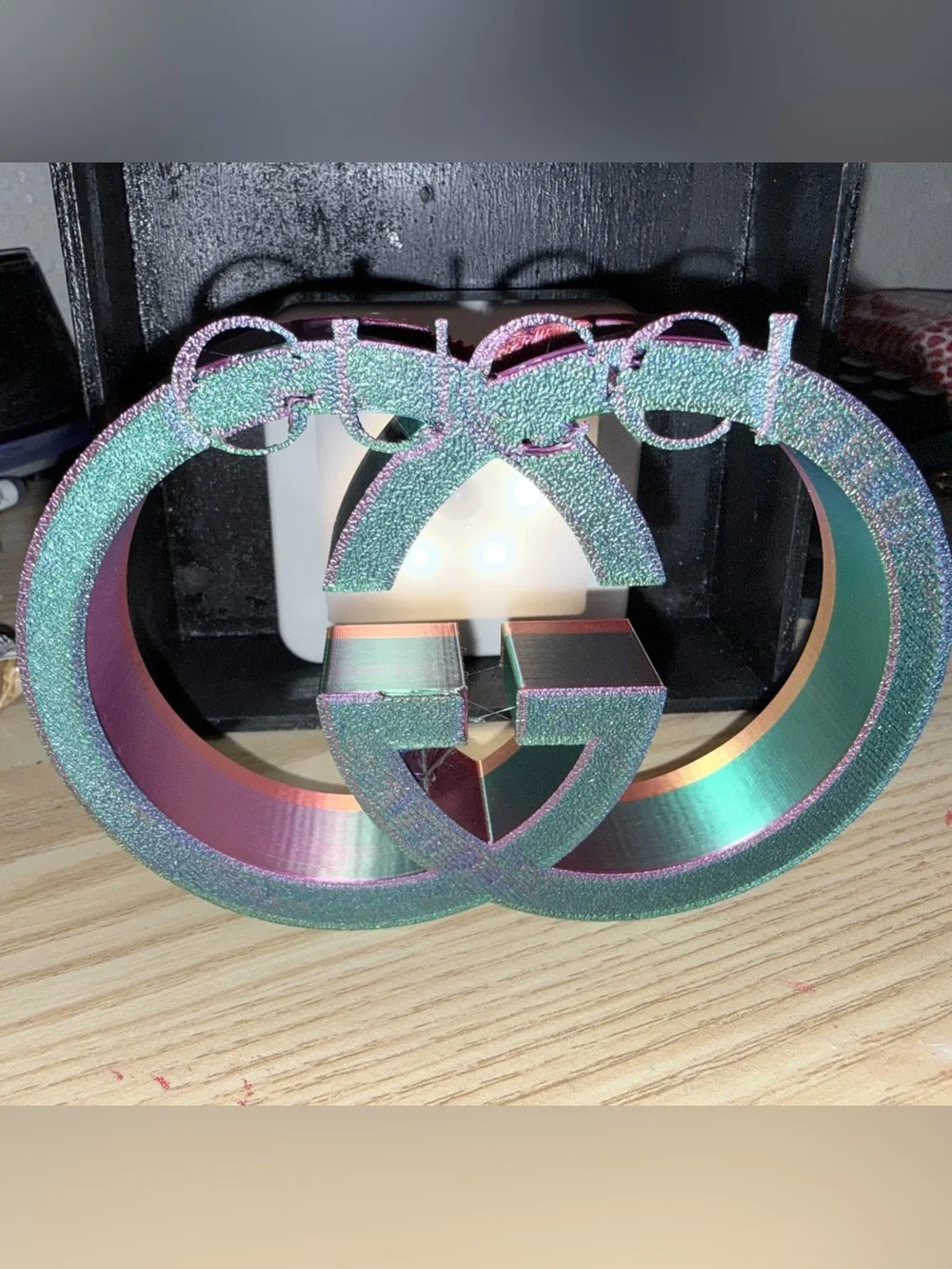 Gucci home accent iridescent color, changing purple, green gold
